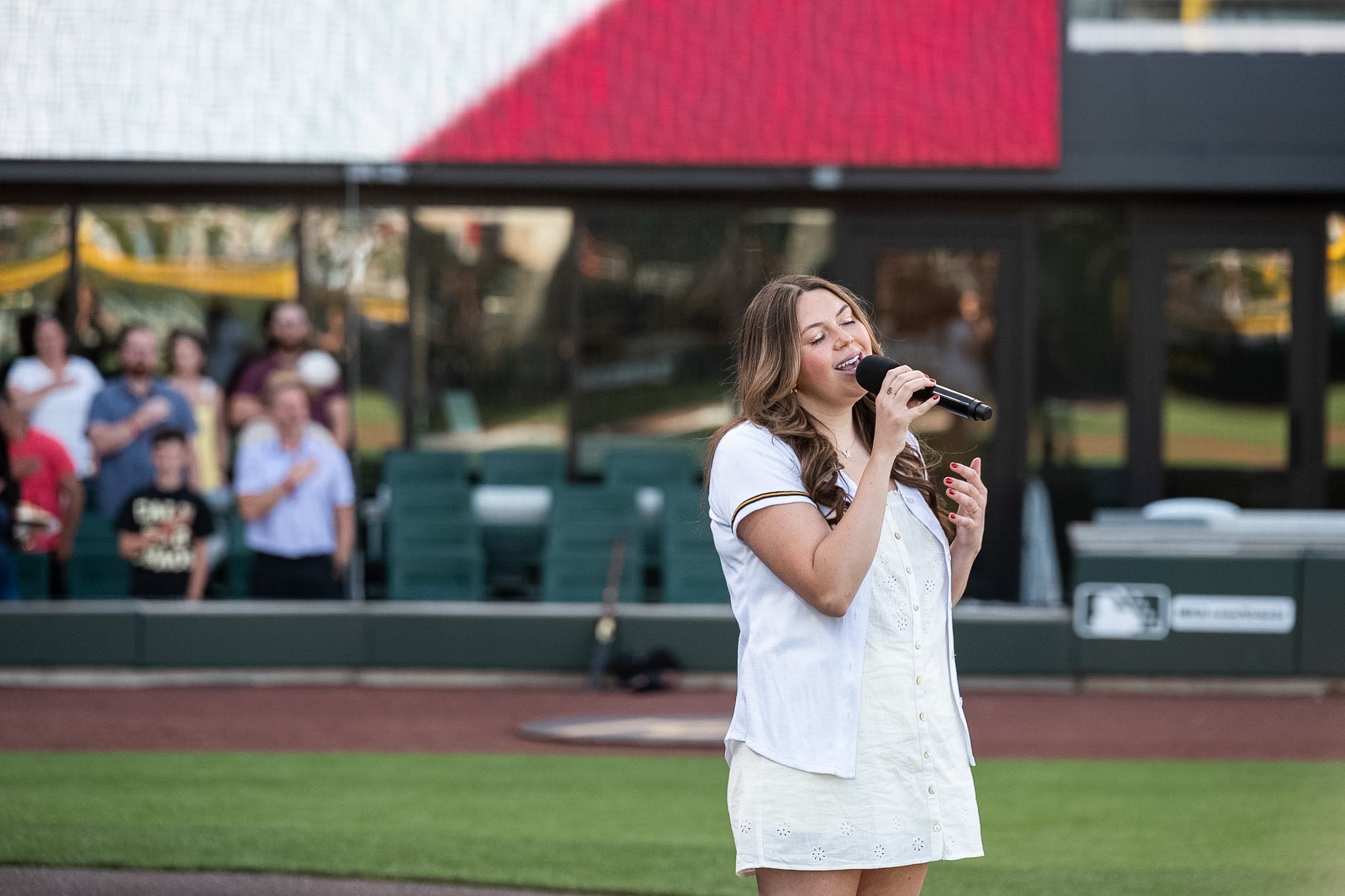 Load video: Alli Brown sings the national anthem for the Salt Lake Bees